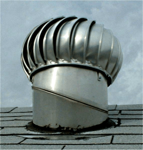 Whirlybird Roof Ventilation A rusty whirlybird roof ventilator.