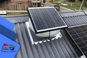 Solar Roof Fan installed on tin roof Solar Roof Fan installed on tin roof