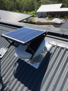 solar roof vent installed in a tin roof solar attic fan installed in a tin roof