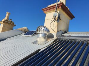 Whirlybird - before 9 june distant Whirlybird on roof